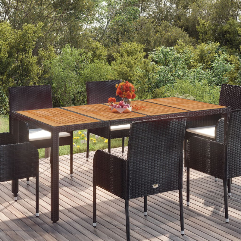 Table de jardin élégant en résine tressée avec dessus en verre