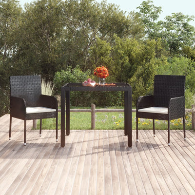 Table de jardin en résine tressée avec dessus en verre noir