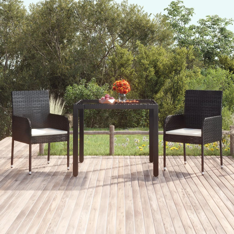 Table de jardin en résine tressée avec dessus en verre noir